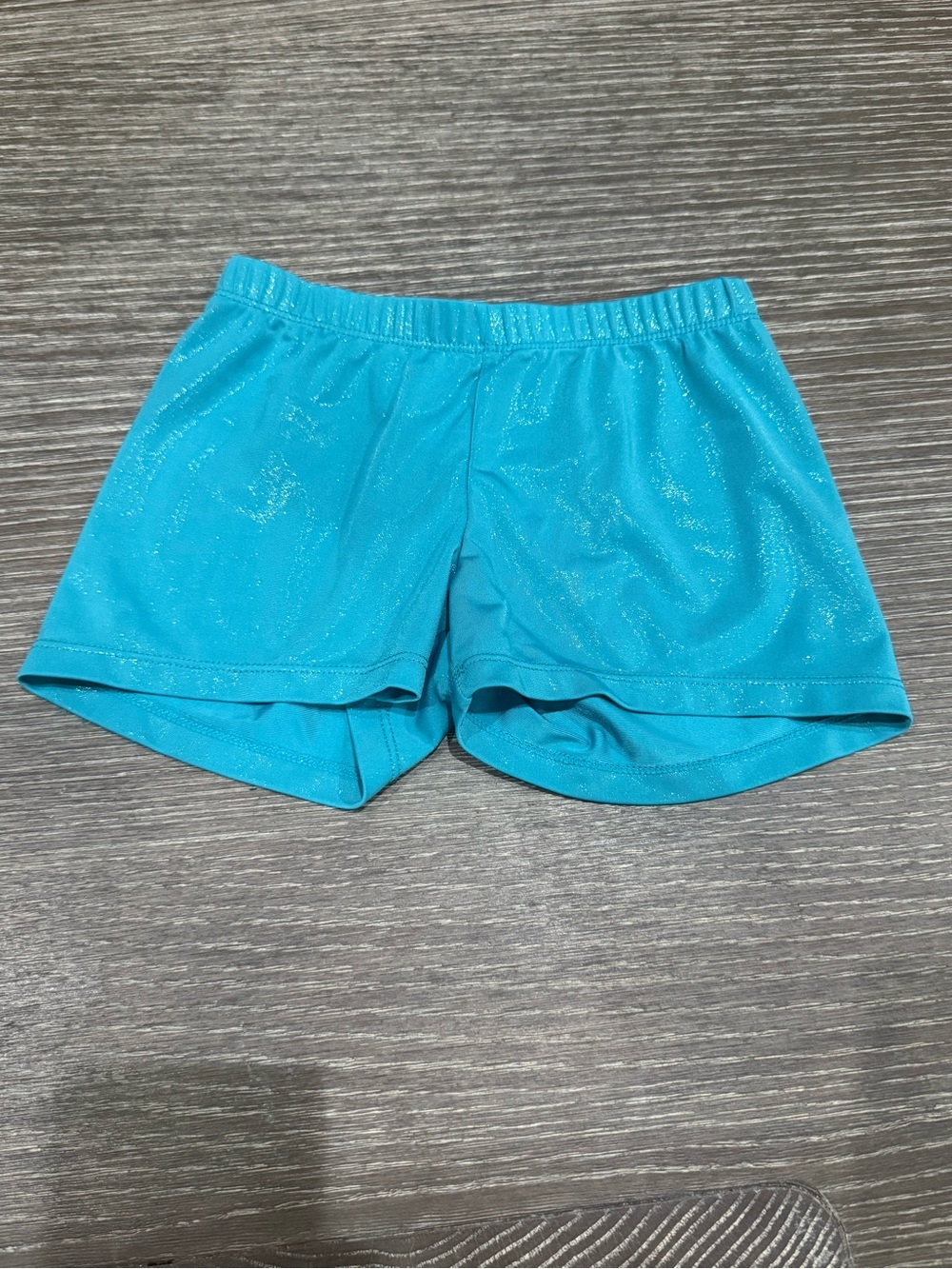 Used size medium 7/8 SHEIN metallic blue Athletic Stretch Shorts